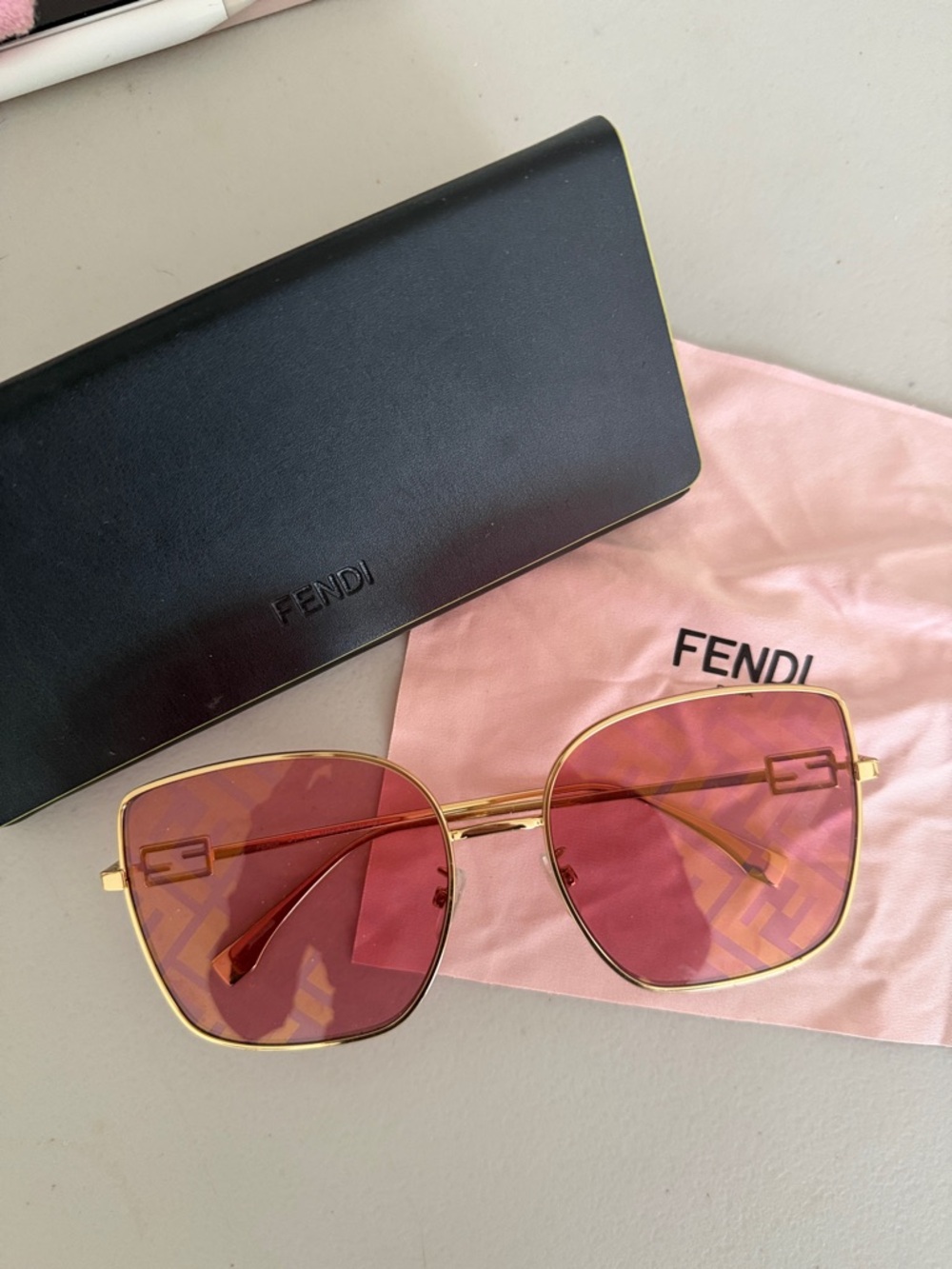 Fendi Gold Frame Sunglasses with Pink Lenses
